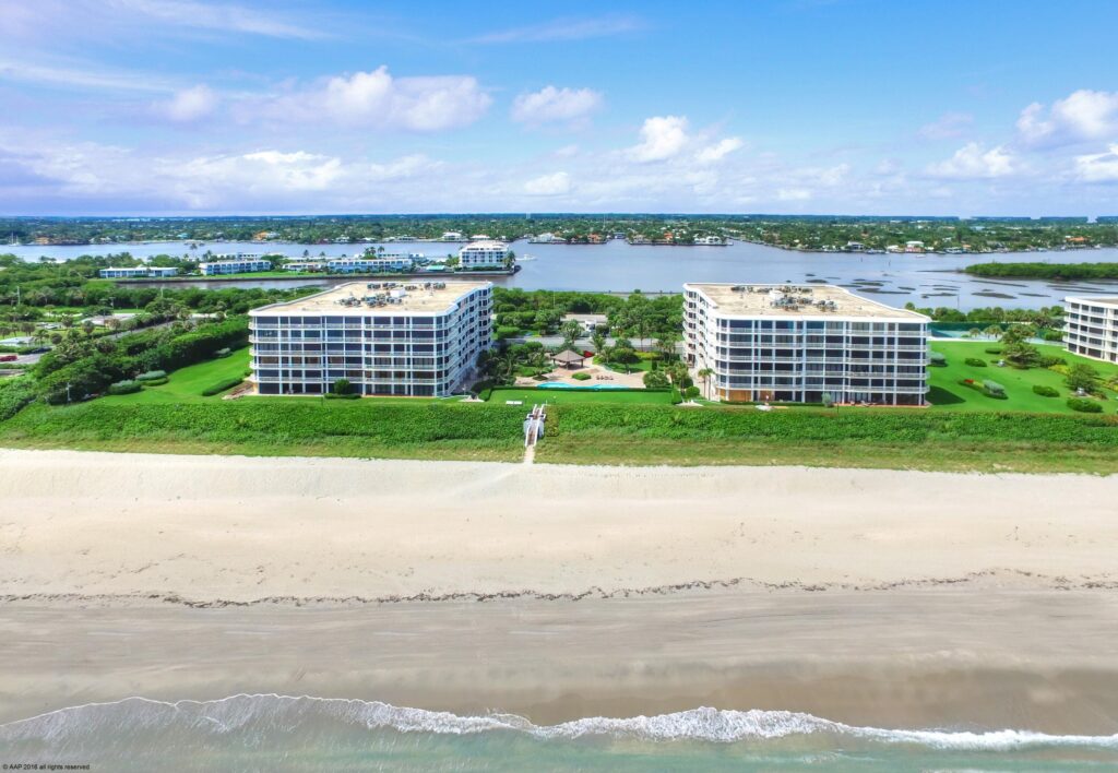 Aerial view of beachfront condos and shoreline