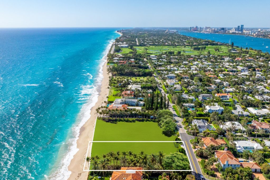 Aerial view of beachfront mansions and ocean