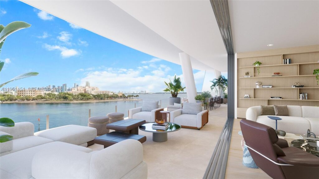 Luxury waterfront living room with terrace view