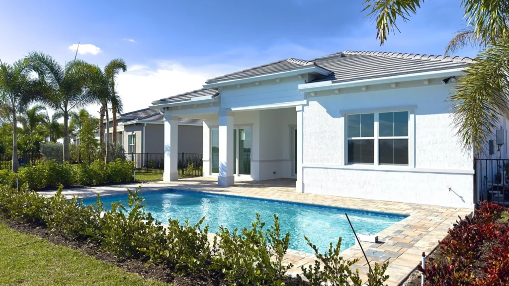 Modern white house with backyard swimming pool